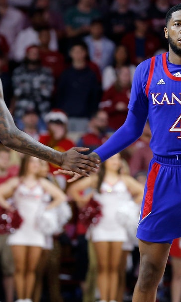 Moss scores 20 in Jayhawks' 66-52 win over Sooners
